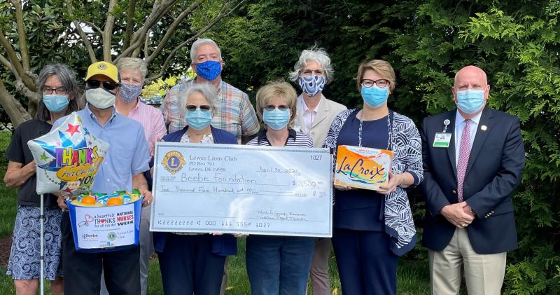 Check presentation attendees shown are in back (l-r) Beebe Medical Foundation Executive Director of Development Kay Young, Gift Officers Dave Szumski and Diane Barlow, and President Tom Protack. In front are Lewes Lions Club member Kat Schmitz, President Lloyd Schmitz, Secretary Joanne Friend, member Kathy Engel and Treasurer Michele Jessup. SUBMITTED PHOTO